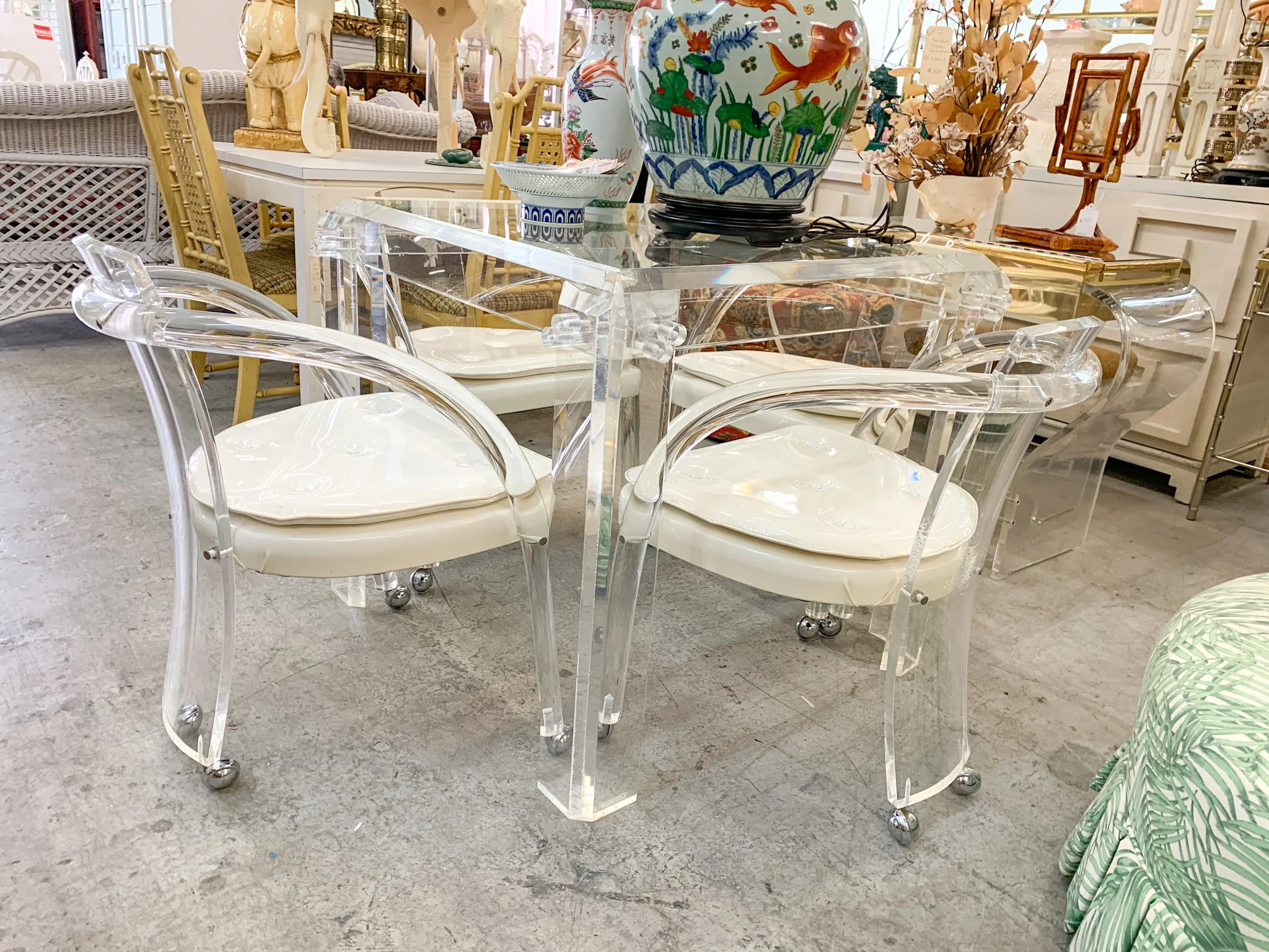 Set of Four Lucite Game Chairs on Casters - Image 3